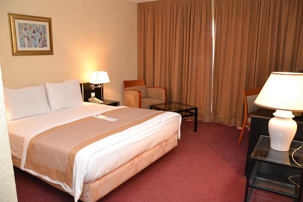 Hotel Sawa Дуала Экстерьер фото