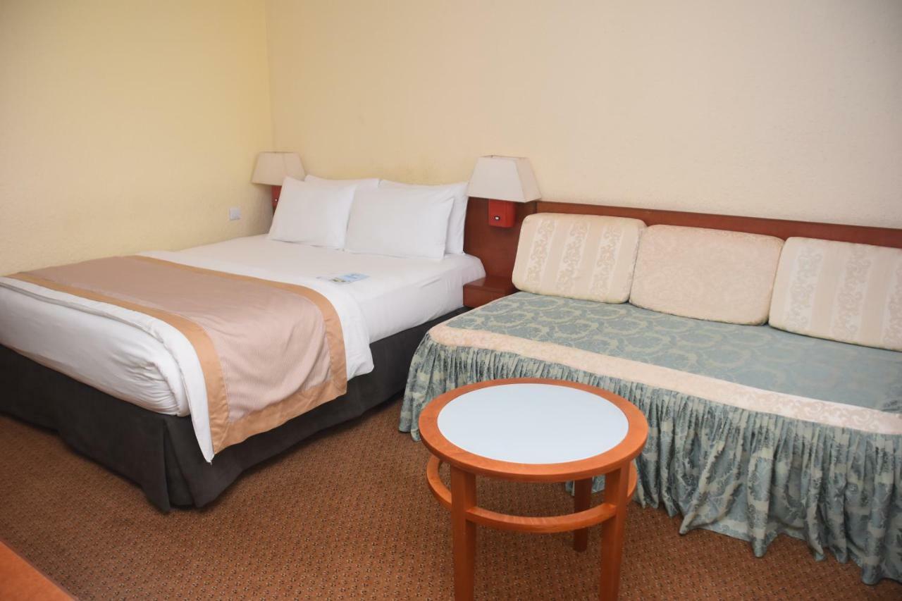 Hotel Sawa Дуала Экстерьер фото